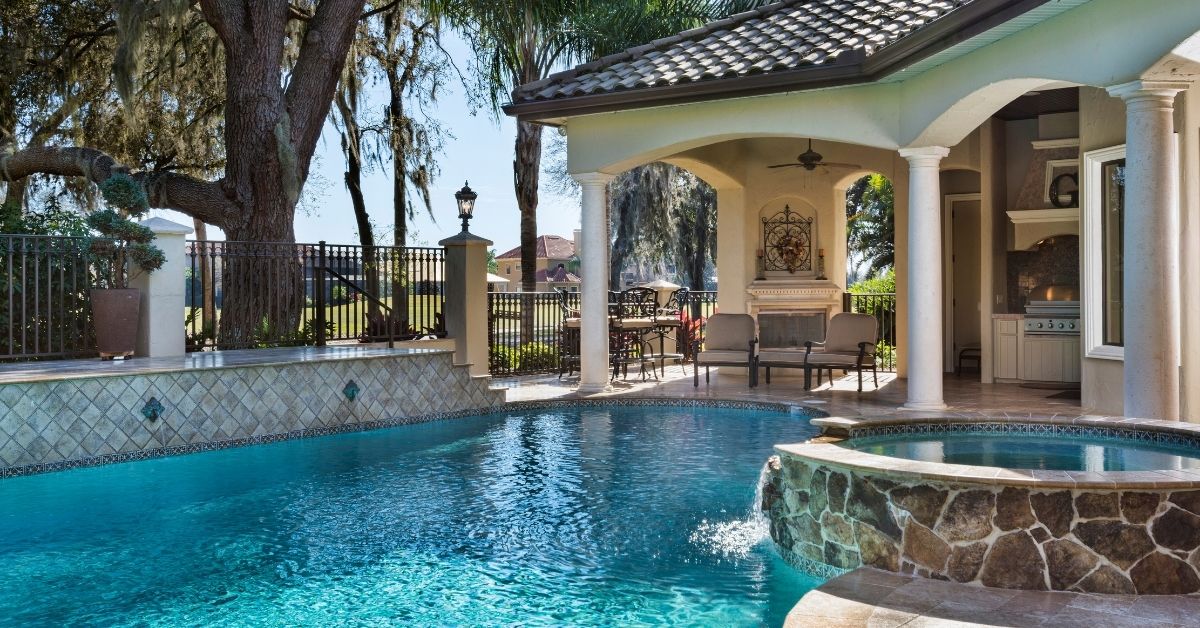 backyard pool and outdoor kitchen designs